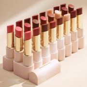 Rare Beauty With Gratitude Dewy Lip Balm assortment of multiple shades.