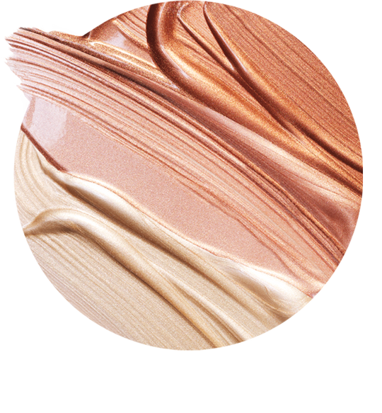 Rare Beauty makeup swatch in multiple liquid highlighter shades.