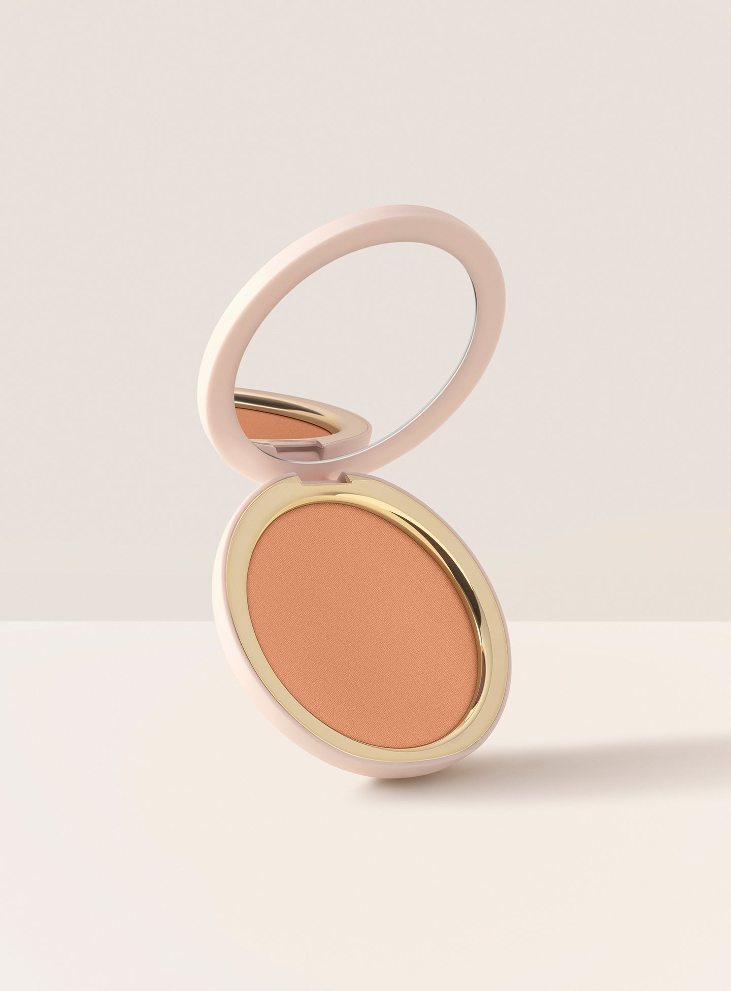 Summer Feels| Rare Beauty Warm Wishes Soft Matte Powder Bronzer in Summer Feels a light tan shade with warm undertone for pale to light skin