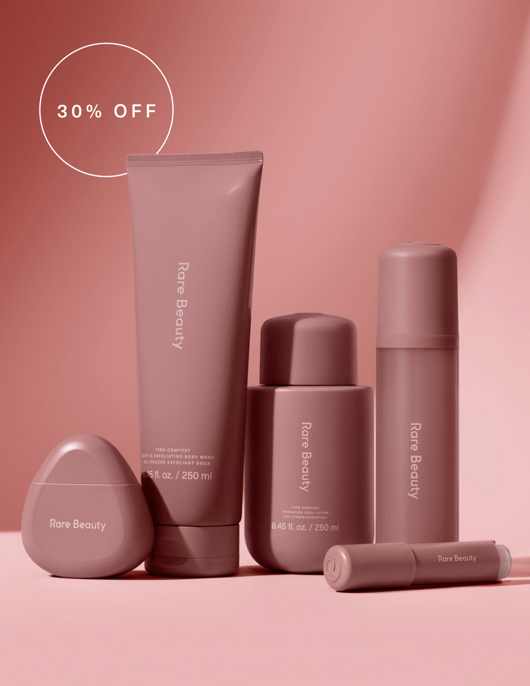 Set of 'Rare Beauty' body products on a pink background with a 30% off label.
