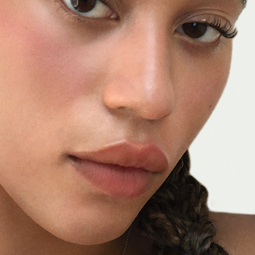 Rare Beauty makeup model featured on the site.