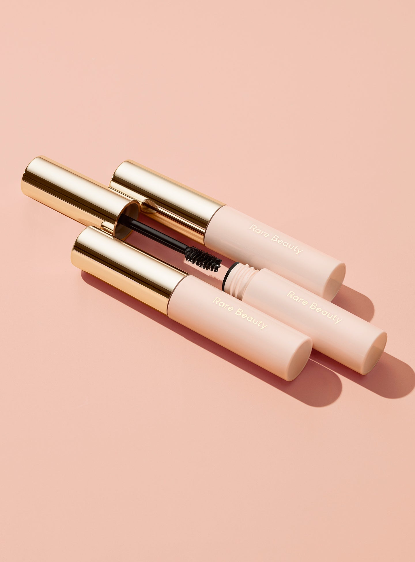 Three tubes of the Rare Beauty Brow Harmony Flexible Lifting Gel.