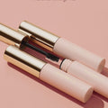 Tubes of Rare Beauty's Brow Harmony Flexible Lifting Gel.