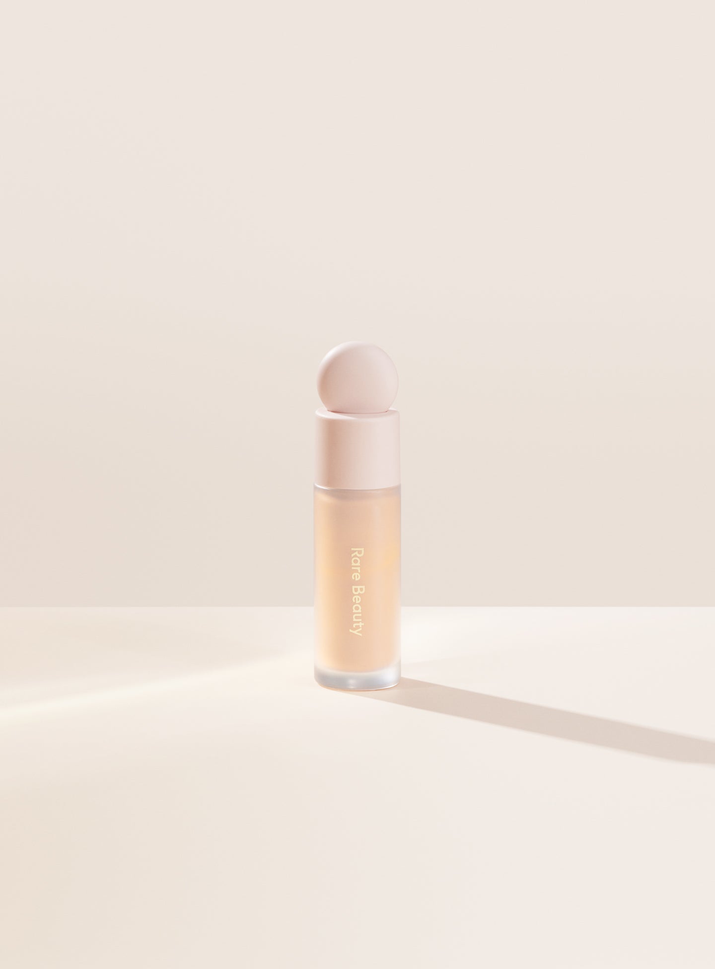 Rare Beauty Liquid Touch brightening concealer bottle, 120C shade