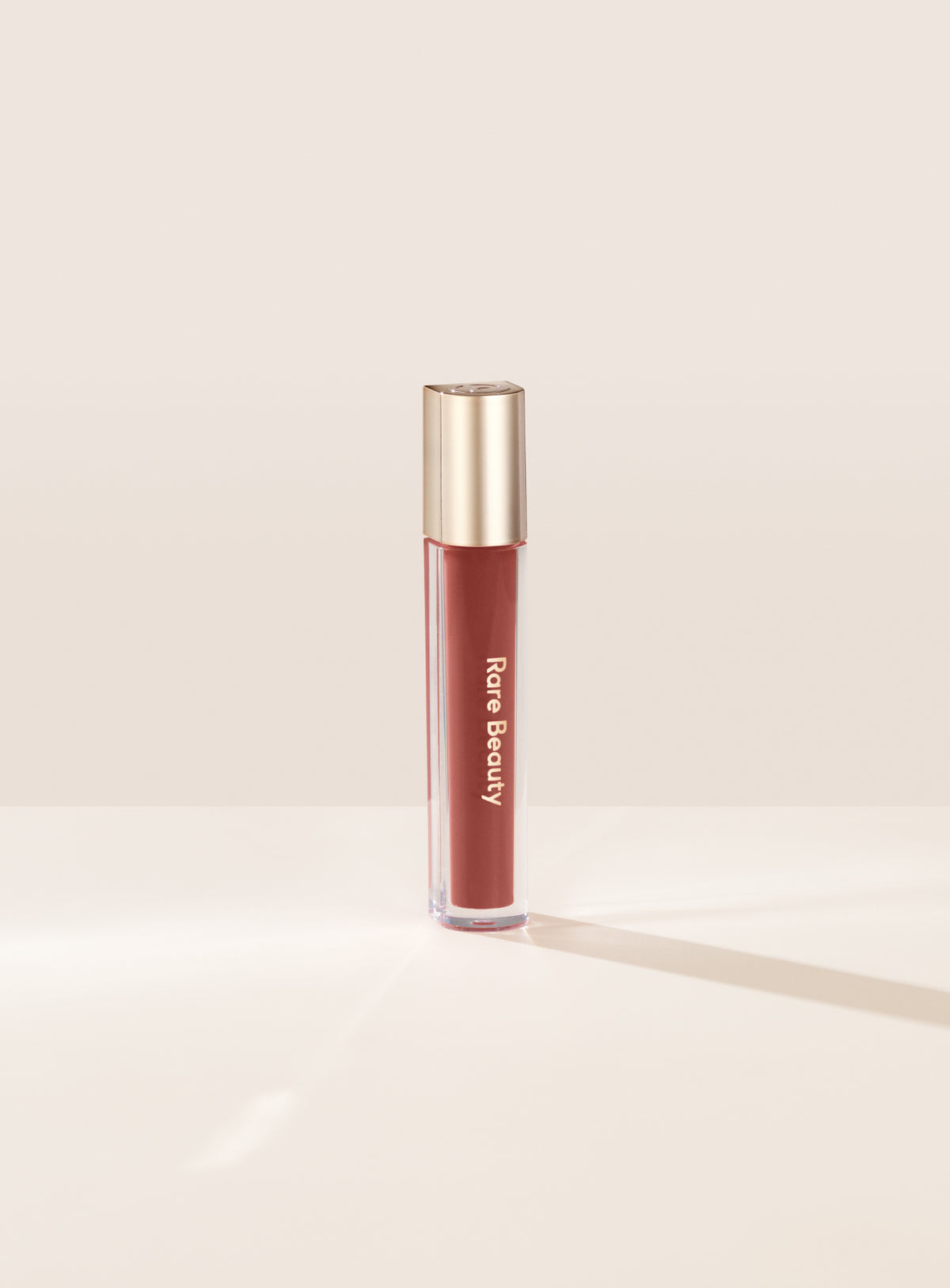 RARE BEAUTY Stay Vulnerable Glossy Lip Balm