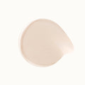 A beige swatch of Rare Beauty's Illuminating Primer